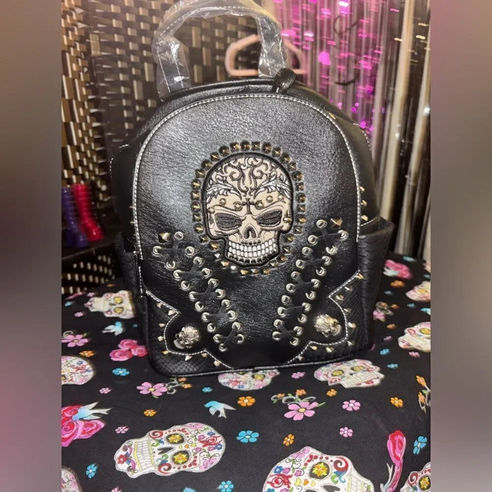 Edgy Backpack with Studded Skull Design